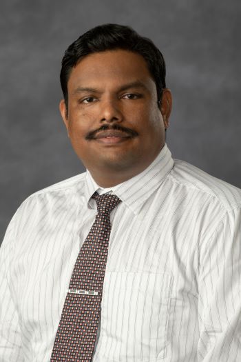 Dr. Muthusamy